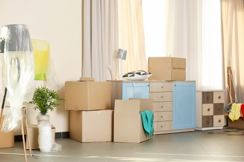 Student removals support in Earls Court with boxes and small furniture