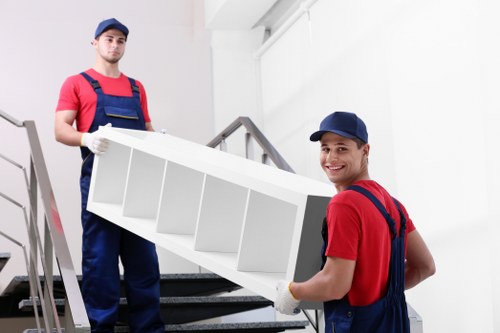 Moving team handling a home relocation in Earls Court