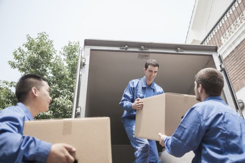 Professional movers handling a flat relocation in Earls Court