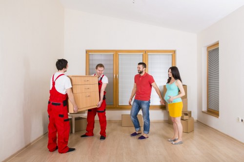 Packed boxes and furniture prepared for an Earls Court move