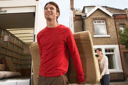 Moving day preparation with boxes and packing materials in Earls Court