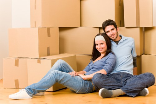 Local movers preparing items for transport in West London