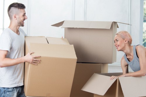 Packed office boxes and furniture ready for a commercial move