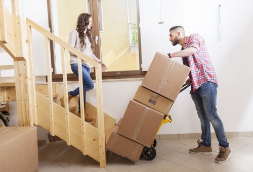 Packed household items ready for storage in a West London flat